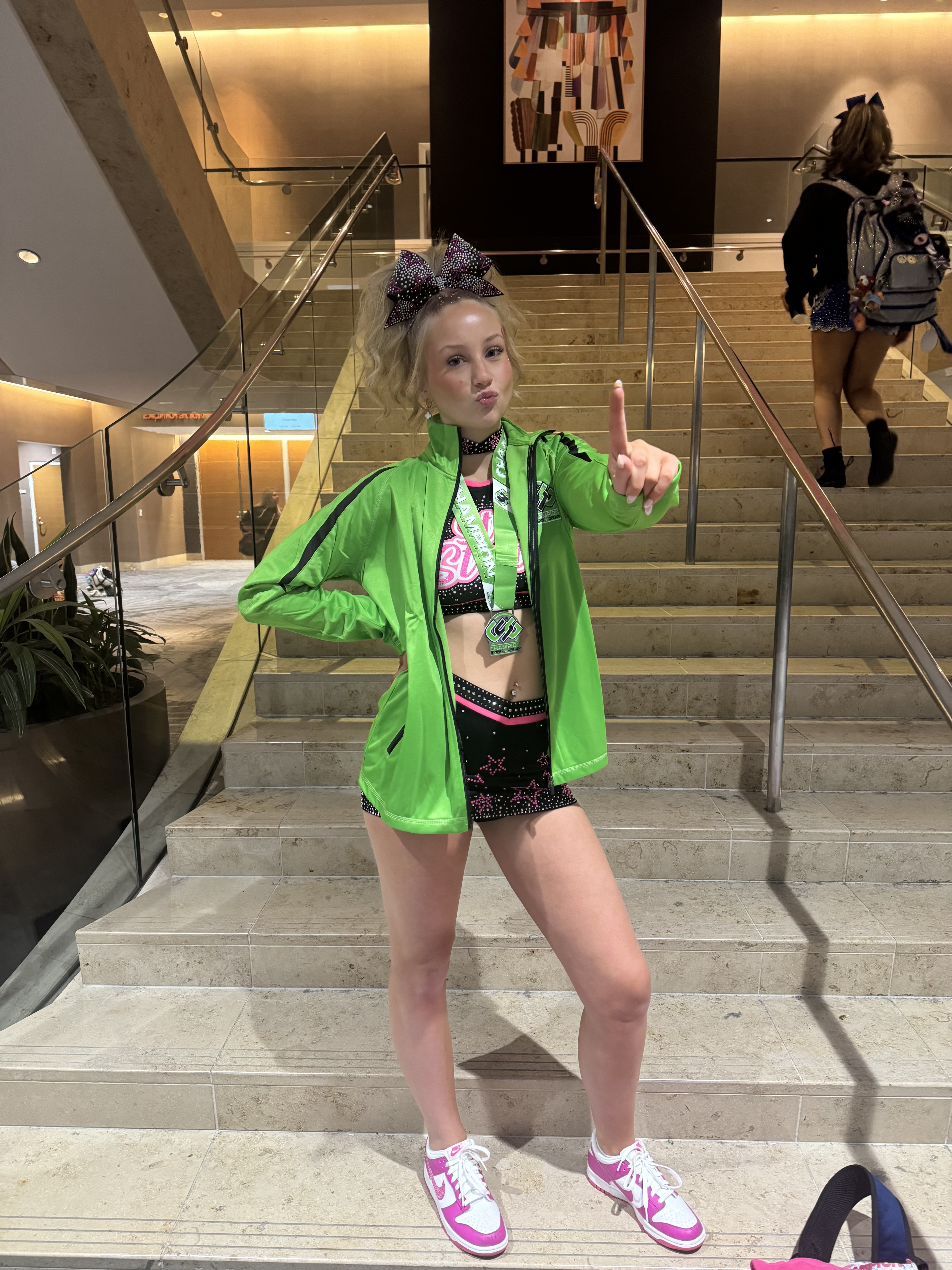 Ashlyn posing with her championship medal
