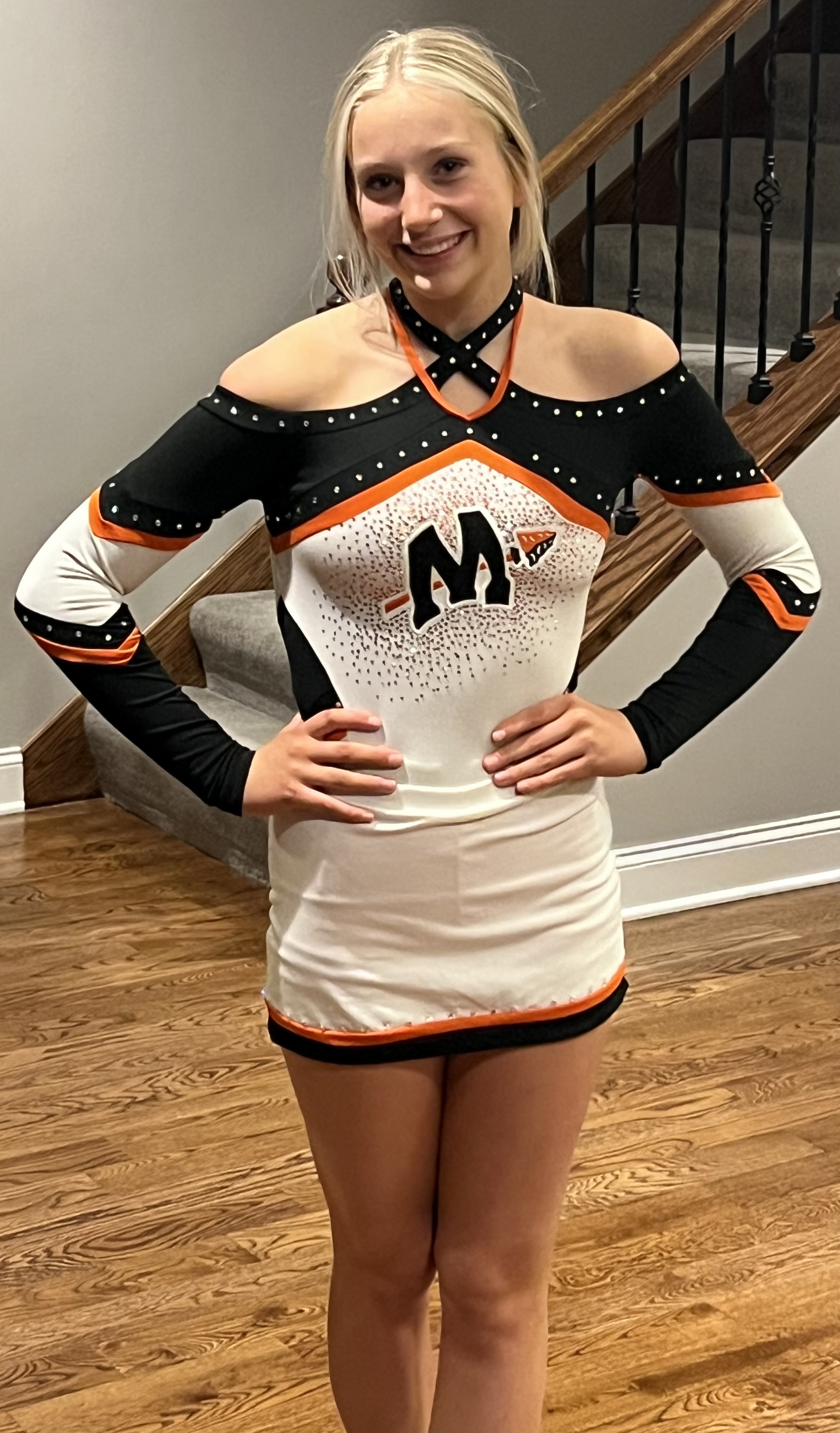 Ashlyn in her Minooka High School cheer uniform